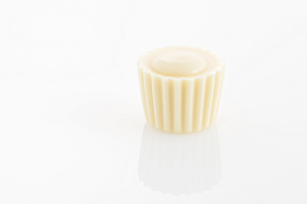 Mellow and creamy solid white couverture chocolate truffle with 30% cocoa butter content