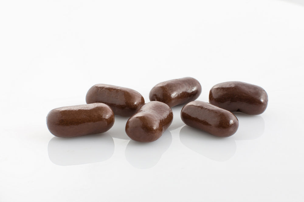 Group of Jumbo Sized Liquorice Bullets coated in couverture dark chocolate