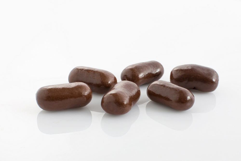 Group of Jumbo Sized Liquorice Bullets coated in couverture dark chocolate