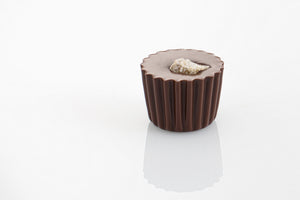 Ginger Truffle - A soft truffle centre infused with ginger flavour, surrounded in a rich dark couverture chocolate case and topped with real ginger