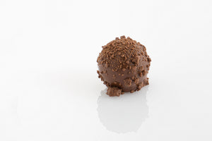 Grand Marnier Truffle - a smooth orange Grand Marnier ganache centre enrobed in couverture milk chocolate with a milk chocolate crumbed coating