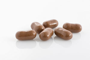 Group of Jumbo Sized Liquorice Bullets coated in couverture milk chocolate from Share Chocolates