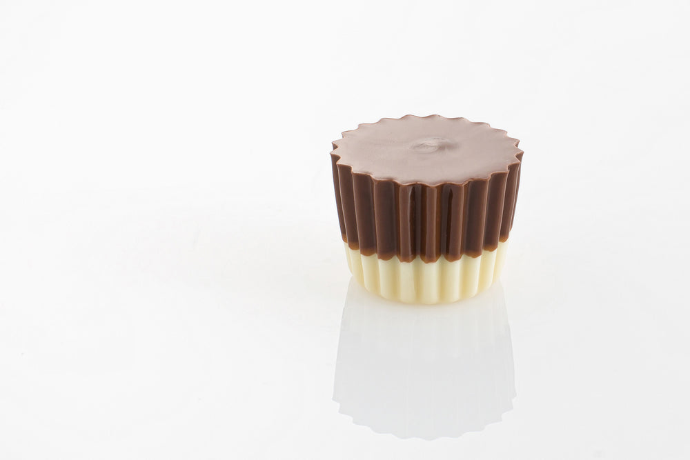 Mil On White Truffle - A smooth white chocolate ganache filling encased in milk chocolate with a solid white couverture layer