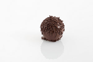 Rum Ball - A creamy dark couverture chocolate and rum infused truffle filling enrobed in couverture dark chocolate and rolled in chocolate dollarettes