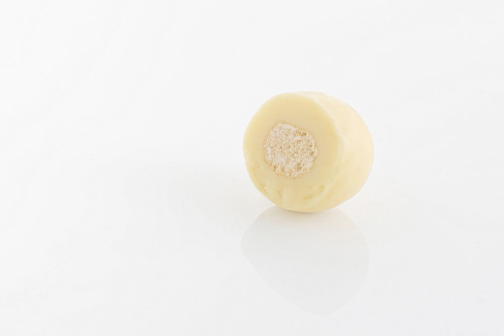 Single Malt Ball center encased in smooth white couverture chocolate