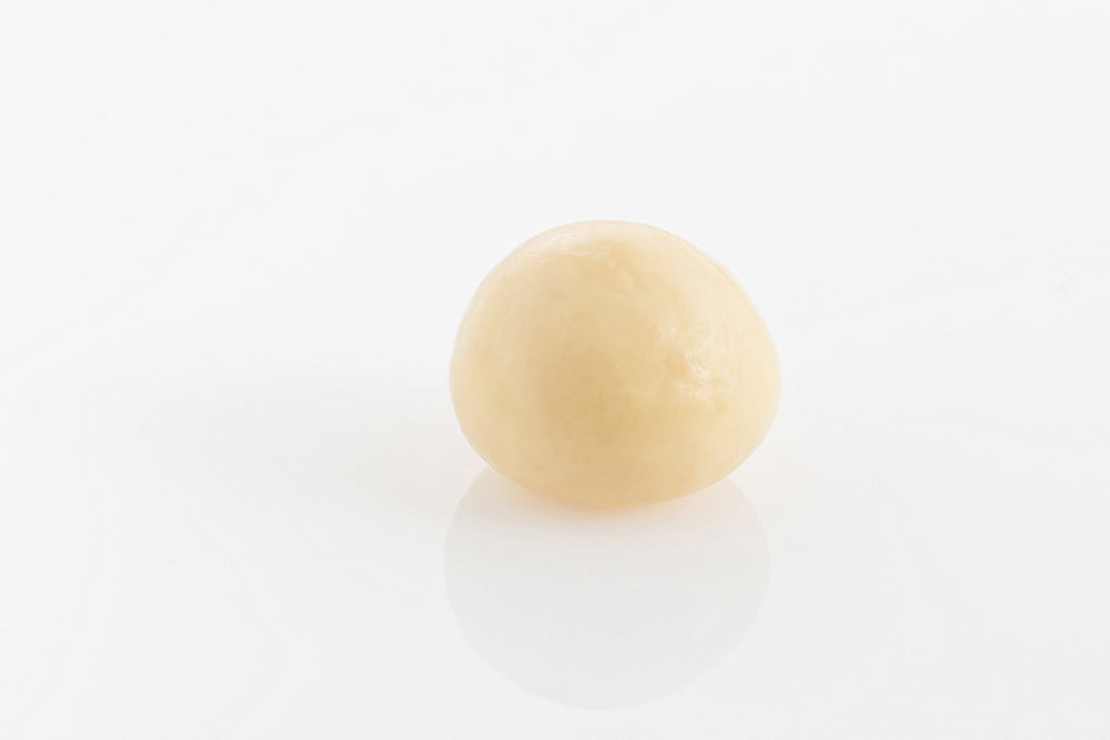 Single Chewy Raspberry encased in smooth white couverture chocolate from Share Chocolates